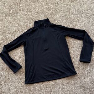 Under Armour black long sleeve pullover running top.
